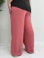 Pantalon fluide rose "Jade" avec ceinture fleurie en tissu