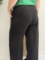 Pantalon fluide noir "Jade" avec ceinture fleurie en tissu