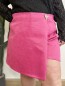 Jupe short broche Esmée fuschia