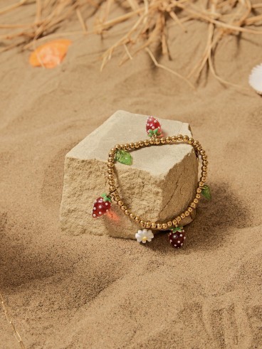 Bracelet doré breloques fraises et marguerites
