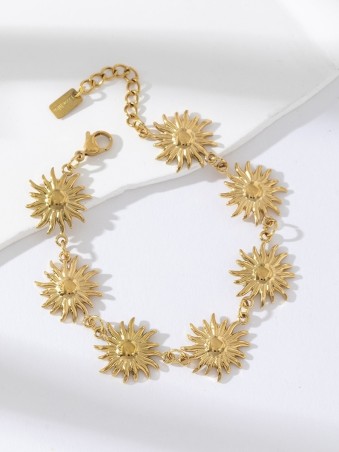 Bracelet doré avec 7 soleils