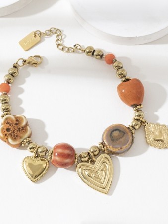 Bracelet doré avec pierres terracotta