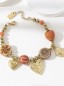 Bracelet doré avec pierres terracotta