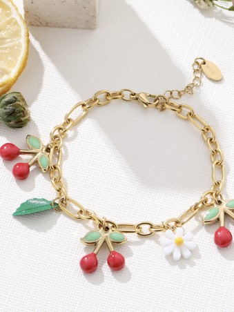 Bracelet doré avec cerises et marguerite