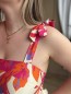 Robe midi fleurie à bretelle nouées Robe midi fleurie à bretelle nouées
