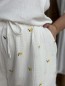 Short en gaze de coton blanc brodé citrons Short en gaze de coton blanc brodé citrons