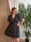 Robe courte fluide à pois noir Robe courte fluide à pois noir