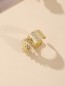 Bague dorée avec breloque soleil