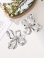 Boucles d'oreilles argentées fleur 4 pétales