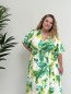 Robe longue fluide "Olivia" avec ceinture imprimé feuilles vertes curvy Robe longue fluide "Olivia" avec ceinture imprimé feuilles vertes curvy