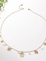 Collier doré multi fleurs et perles